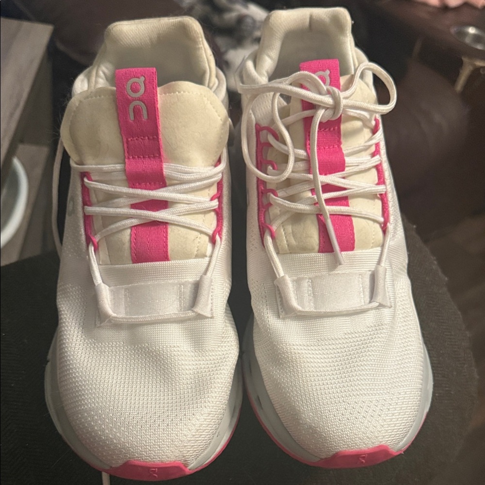 On Cloud White and Pink Athletic Shoes